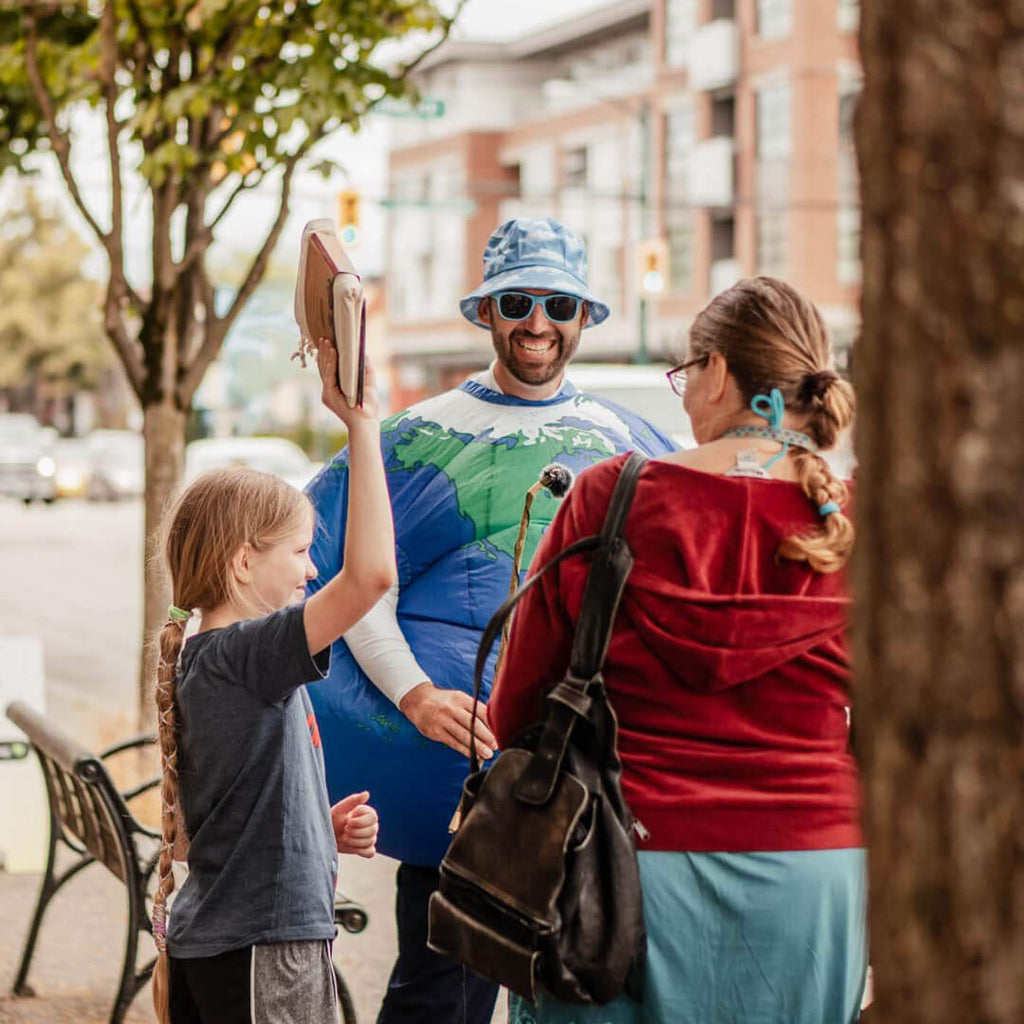 Rejoicing after winning some plastic free produce bags.