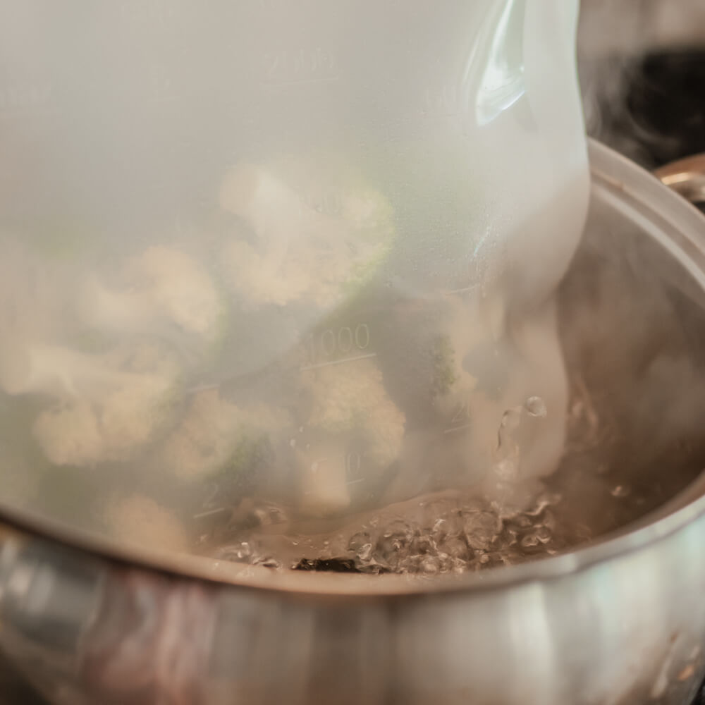 Large Silicone Zip Sealer holding broccoli showing sous vide.