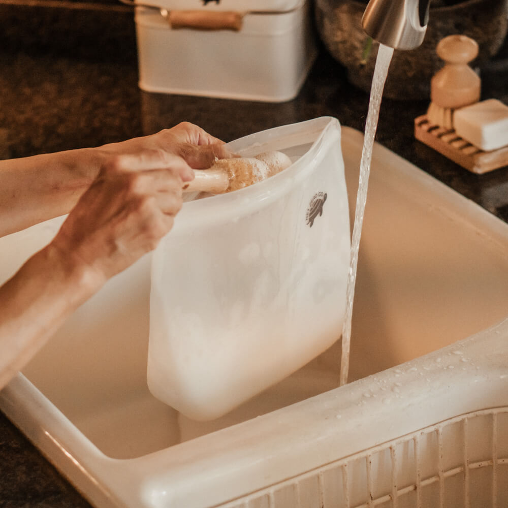 Hand washing Silicone Zip Sealer with plant-based cleaning brush.