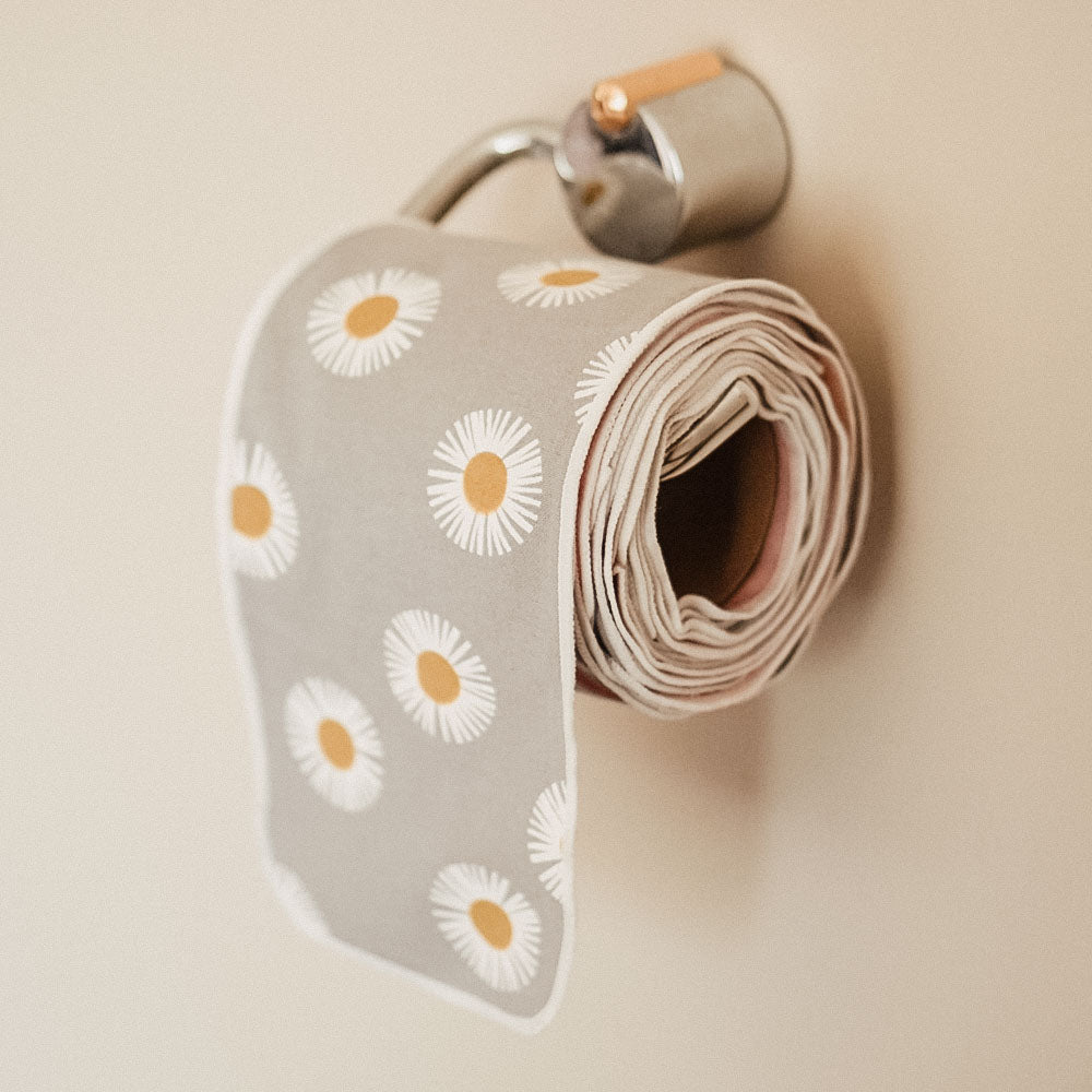 Net Zero Co. reusable toilet paper roll with daisy flower pattern