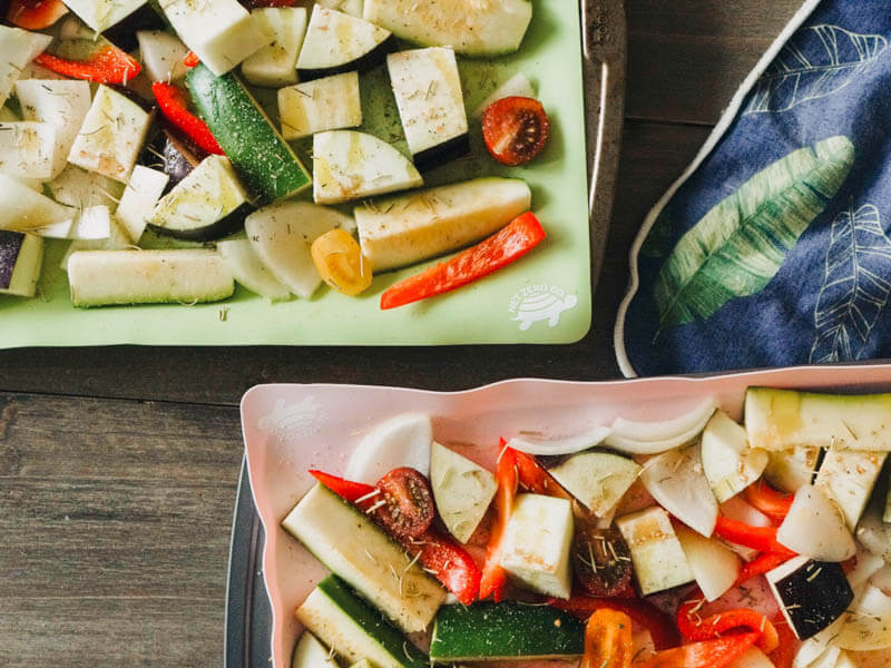 Silicone baking mats roasting vegetables.