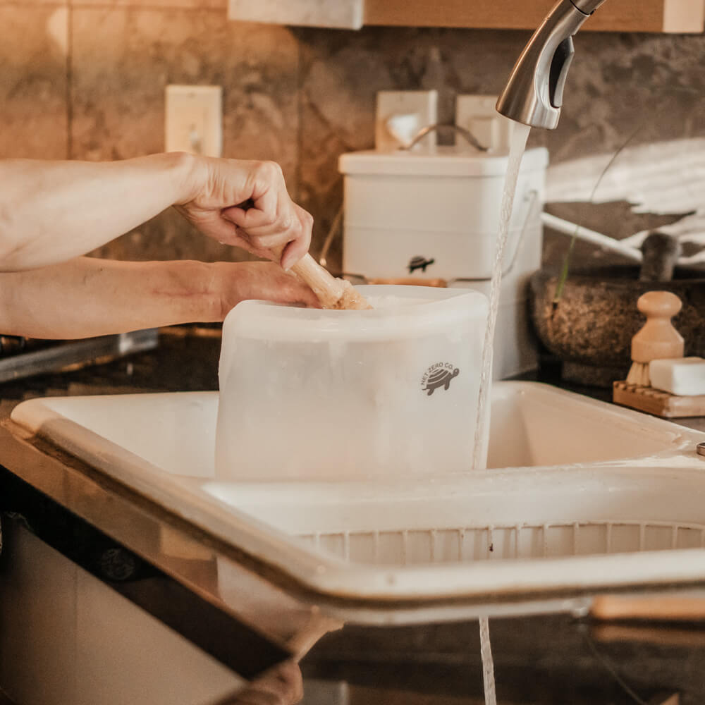 Hand washing jumbo Silicone Zip Sealer with plant-based cleaning brush.