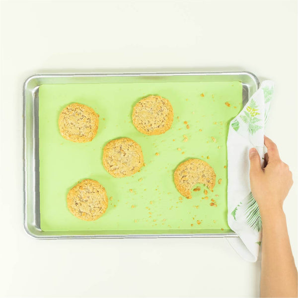 https://www.netzerocompany.com/cdn/shop/products/handmade-cookie-towel-green-reusable-silicone-baking-mat-liner-1000x1000_grande.jpg?v=1643983586