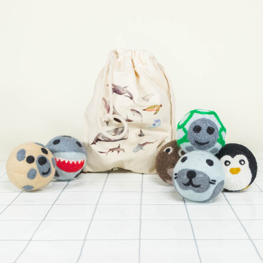 Set Of Six Wool Dryer Balls With Marine Animal Print And Cotton Bag